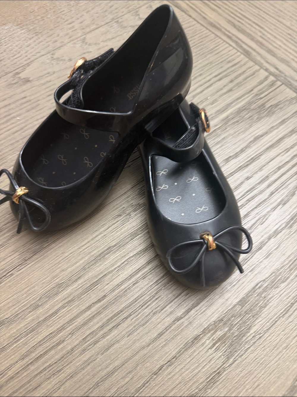 Mini Melissa Black Mary Jane Dress Flats with Bow and Gold Accent